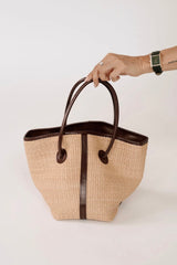 LEATHER-TRIMMED RAFFIA BUCKET BAG