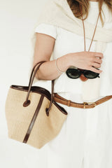 LEATHER-TRIMMED RAFFIA BUCKET BAG