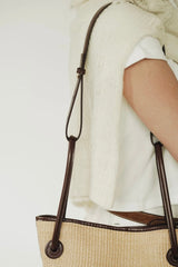 LEATHER-TRIMMED RAFFIA BUCKET BAG