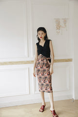 IRREGULAR RUFFLED SLEEVELESS TOP