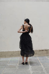 SLEEVELESS PLEATED DRESS