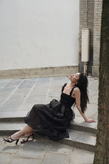 SLEEVELESS PLEATED DRESS