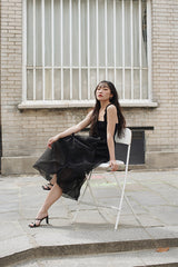 SLEEVELESS PLEATED DRESS