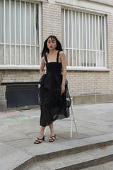 SLEEVELESS PLEATED DRESS