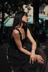 SLEEVELESS PLEATED DRESS