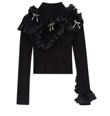 BLACK KNITWEAR WITH RUFFLES