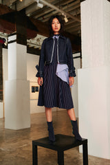 STRIPED DRESS WITH NECKLINE EMBELLISHED