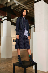 STRIPED DRESS WITH NECKLINE EMBELLISHED