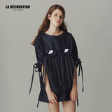 FUNNY EXPRESSION PLEATED DENIM TOP WITH SHORT SLEEVE AND FLOUNCE