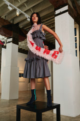 SLIP DRESS WITH FLOUNCES