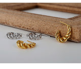 WHITE GOLD/ 18K GOLD TWIST EARRINGS