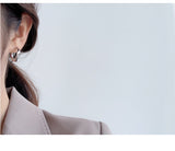 WHITE GOLD/ 18K GOLD TWIST EARRINGS