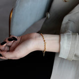 WHITE GOLD/ 18K GOLD CROP-SHAPED BRACELET