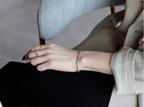 WHITE GOLD/ 18K GOLD CROP-SHAPED BRACELET