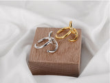 WHITE GOLD/ 18K GOLD KNOT RING