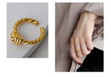 WHITE GOLD/ 18K GOLD KNOT RING