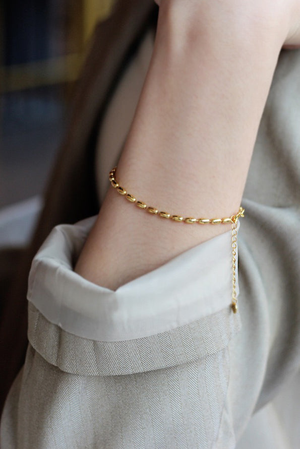 WHITE GOLD/ 18K GOLD CROP-SHAPED BRACELET